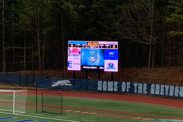 Outdoor LED digital display scoreboard at Pope High School