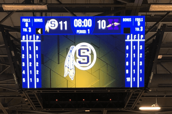 The digital scoreboard for an indoor facility